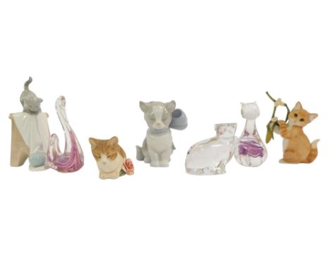 A group of collectables, to include a Lladro porcelain figure modelled as a cat wearing a bow, 10cm high, Country Artists fig