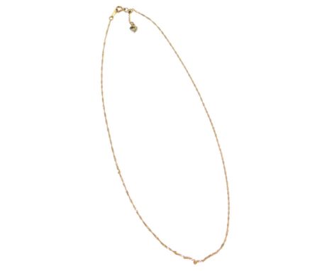 A fancy link neck chain, with bar clasp and heart drop, yellow metal, stamped K10, 1.2g. 