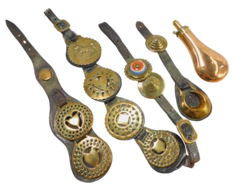 A powder flask and two sets of horse hames. 