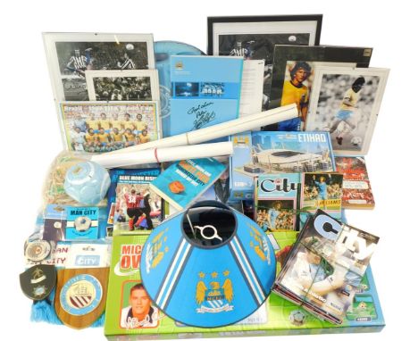 A group of Manchester City and other footballing ephemera, to include football programmes, pictures, limited edition prints b