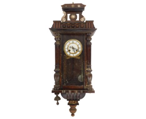 An early 20thC walnut cased Vienna wall clock, circular enamel dial bearing Roman numerals, eight day, 85cm high. 