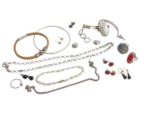 A small group of silver and other jewellery, comprising earrings, mother of pearl bracelet, torc bangle, dress rings, etc. (a