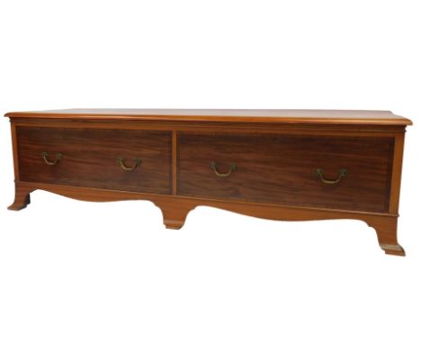 A mahogany bench, with two frieze drawers, raised on bracket feet, converted from a wardrobe, 52cm high, 184cm wide, 55cm dee
