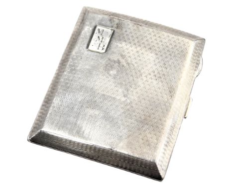 A George V silver cigarette case, of rectangular form with concave top, engine turned decoration, with reserve bearing the in