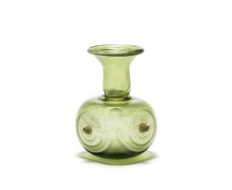  A Roman olive green glass four-sided sprinkler flask  Circa 2nd-3rd Century A.D.9.2cm high Footnotes:Provenance:with Galerie