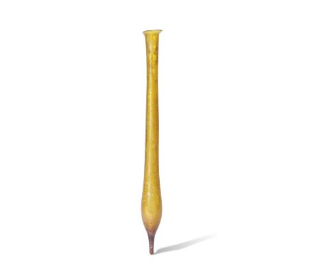  A tall Roman amber glass pointed unguentarium Circa 1st Century A.D.23.5cm high Footnotes:Provenance:                       