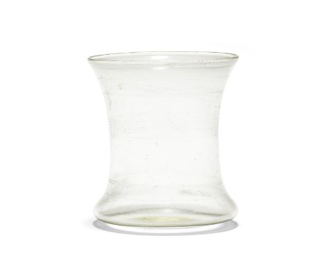  A Roman wheel-engraved colourless glass beaker Circa 1st-2nd Century A.D.10.7cm highFootnotes:Provenance: Anonymous sale; So
