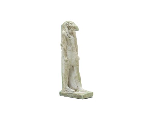  An Egyptian light green faience amulet of striding Thoth Late Period, circa 664-332 B.C.5.1cm high Footnotes:Provenance:with