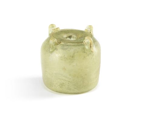  A Roman olive-green glass inkwell Circa 4th-5th Century A.D.6.7cm high Footnotes:Provenance:Jacob Hirsch (1874-1955) collect