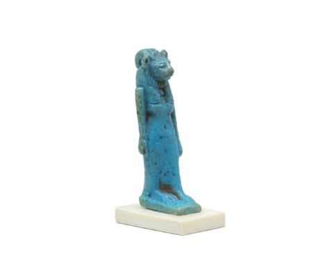  An Egyptian turquoise faience amulet of striding Sekhmet Third Intermediate Period, circa 1069-664 B.C.4.1cm highFootnotes:P