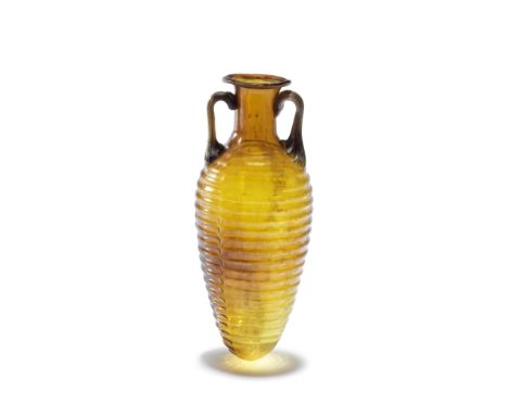  A Roman amber glass ribbed amphora Circa late 1st Century A.D.11cm high Footnotes:Provenance:C.A. Hessing collection. The Ni