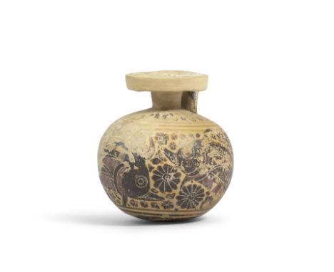  A Corinthian pottery aryballos with dolphins  Attributed to the Panther Bird Group, circa 625-600 B.C.7cm highFootnotes:Prov