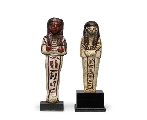  Two Egyptian white glazed faience shabtis for Neb-Neheh and Mehy-Kha New Kingdom, late 18th-early 19th Dynasty, circa 1300 B