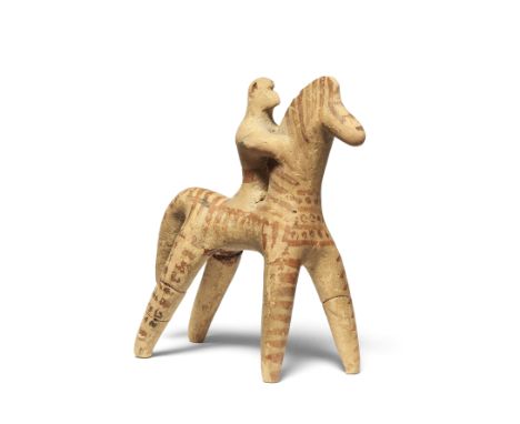 A Boeotian terracotta horse and rider  Circa 600-550 B.C.9.4cm highFootnotes:Provenance:Private collection, Zurich, before 1