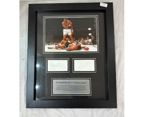 Framed signed print Muhammad Ali bs Sonny Liston  approximate measurements: Height 22.5 inches, width 18.5 inches 