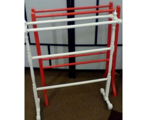 Two vintage towel rails, both painted 