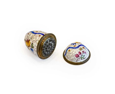 A South Staffordshire Enamel Nutmeg Grater, circa 1780, in the form of an egg, painted with flower sprays on a mottled brown 