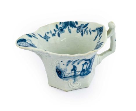 A Worcester Porcelain Cream Boat, circa 1755, of hexagonal form with angular handle, painted in underglaze blue with the Sink