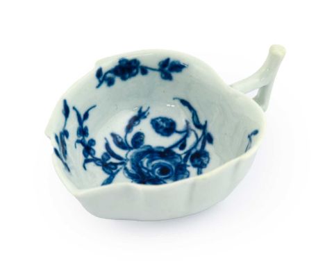 A Worcester Porcelain Leaf Shaped Butter Boat, circa 1758, painted in underglaze blue with the Rose and Floral Sprays pattern