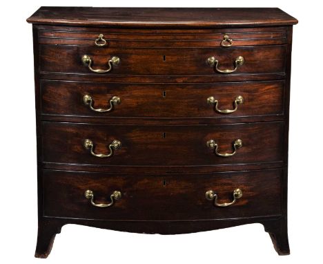 A Late George III Mahogany Bowfront Chest of Drawers, early 19th century, with pull-out brushing slide above four long gradua