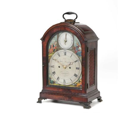 A Mahogany Quarter Striking Table Clock, triple pad top pediment with a carrying handle, fish scale pierced side sound frets,