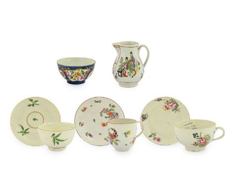 A Champions Bristol Coffee Cup and Saucer, circa 1775, painted with flower sprays and scattered sprigs within brown line bord