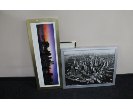 A framed colour print of the New York skyline, black and white framed of Downtown New York, Sara Moon print of a lady, framed