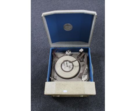 A table top Portadyne electric record player