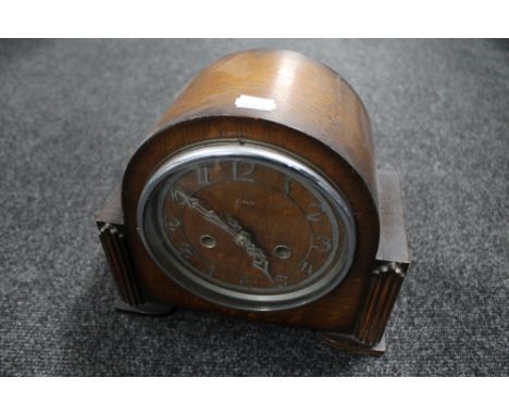 A 1930's oak Smiths Enfield mantel clock