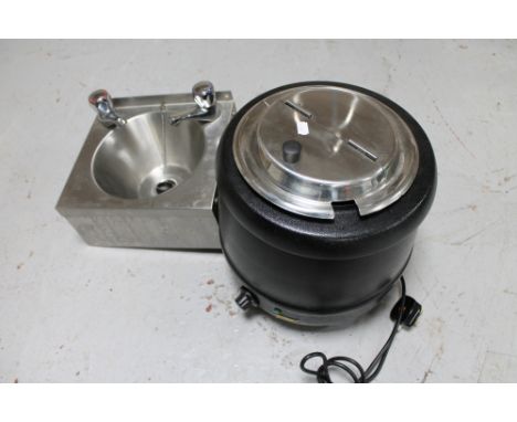 A Vogue stainless steel hand basin and a Buffalo soup kettle. 