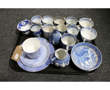 A tray of antique English blue and white tea cups, Royal Worcester blue and white mug, saucer and plate, two pieces of Wedgwo