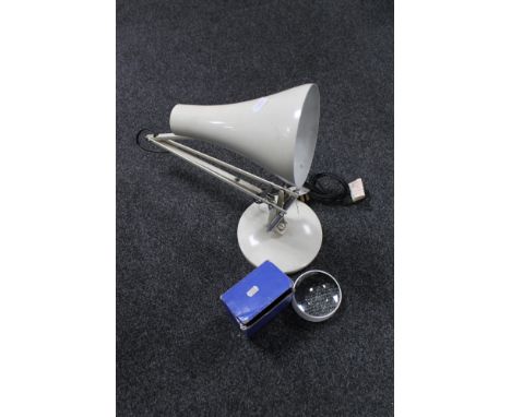 A mid 20th century metal angle poise lamp together with a boxed glass lens