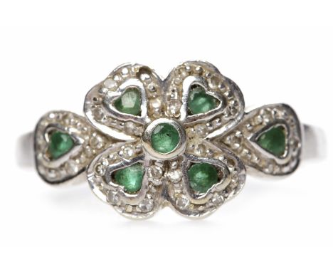 FOUR LEAF CLOVER MOTIF RINGset with emeralds and diamonds, in nine carat white gold, size K, 2.6g