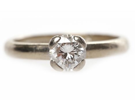 EIGHTEEN CARAT WHITE GOLD DIAMOND SOLITAIRE RINGthe four claw set round brilliant cut diamond of approximately 0.65 carats in