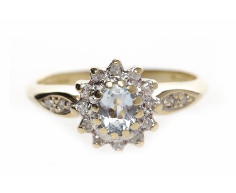 NINE CARAT GOLD GEM SET DRESS RINGset with a central oval blue gem surrounded by round white gems, size K, 2.8g