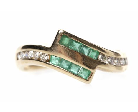 NINE CARAT GOLD EMERALD AND DIAMOND DRESS RINGin the form of a crossover band with channel set square step cut emeralds and c