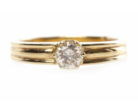 EIGHTEEN CARAT GOLD DIAMOND SINGLE STONE RINGwith a six claw set round brilliant cut diamond of approximately 0.48 carats in 