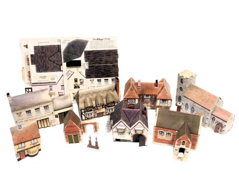 A group of Kellogg's cardboard scale model buildings. (1 box)