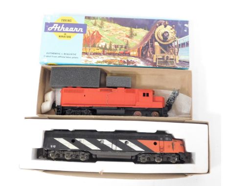 An Athearn N scale locomotive GP38-2 PWR Milwaukee, 4606, in red livery, boxed, together with an N scale Kato 7452 diesel loc