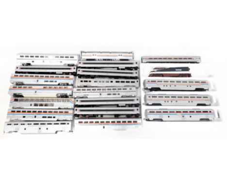 An Athearn OO gauge locomotive, Amtrak 467, together with various Amtrak coaches, etc. (1 box and loose) 