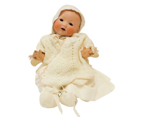 An Armand Marseilles German bisque headed doll, with brown roll eyes and open mouth, with articulated limbs, numbered 351-8.K
