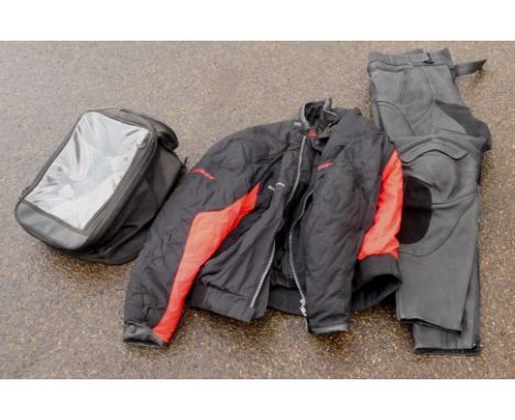 A motorcycle jacket, a pair of Frank Thomas motorcycle trousers, a Takai tank bag, and EBC brake pads. (a quantity)