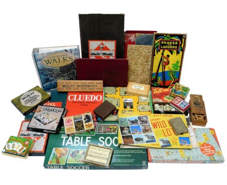 Various board games, including John Waddington Limited Monopoly, Spear's Games Travel Scrabble, Vic Toy Spy Trap, House Marti