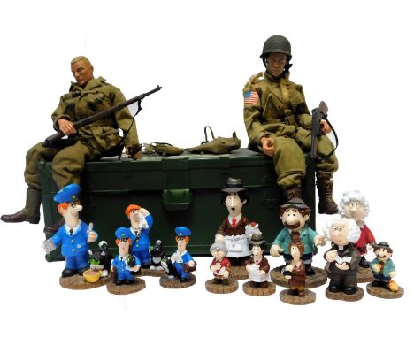 An Action Man travel case, and two Action Men figures, in Airborne and Japanese army uniforms, and a collection of Postman Pa