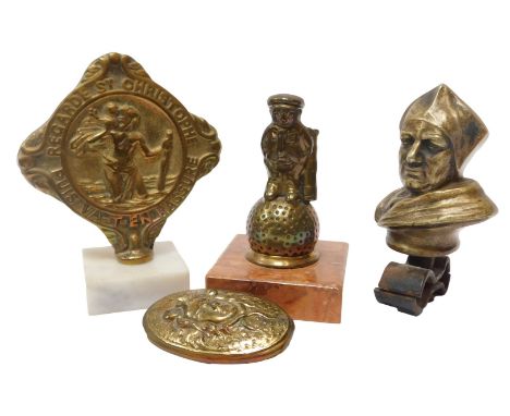 Four brass car mascots, including a St Christopher medallion mounted on a marble base, a Dunlop golfing car mascot, and a bra