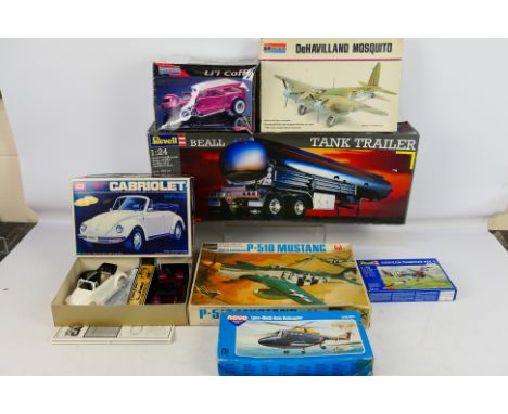 Hasegawa - Monogram - Revell - Seven boxed plastic model kits in various scales. Lot includes Revell #07554 1:24 Beall Tank T