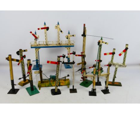 Hornby and other - a varied collection of 16 off O scale tinplate signals, ca 1930s
