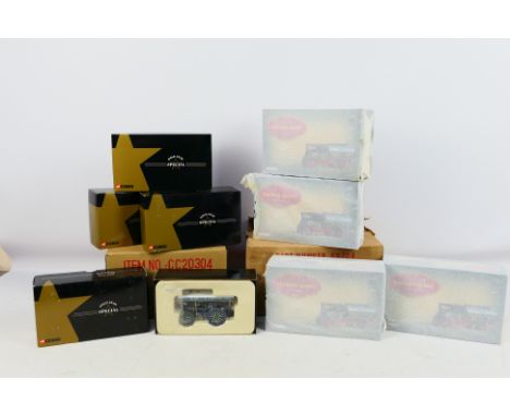 Corgi - Unsold Shop Stock - A pair of trade boxes to include a box of 4 x #CC20304 Garrett 4CD Showman's Tractor Pride of the