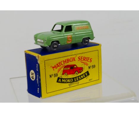 Matchbox - A boxed Ford Thames Van in Singer livery with grey plastic wheels # 59. The model appears Mint in a Very Good box 