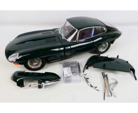 Deagostini - An unboxed and partially constructed Deagostini 1:8 scale 'Build Your Own' Jaguar E-Type. The model has some lig